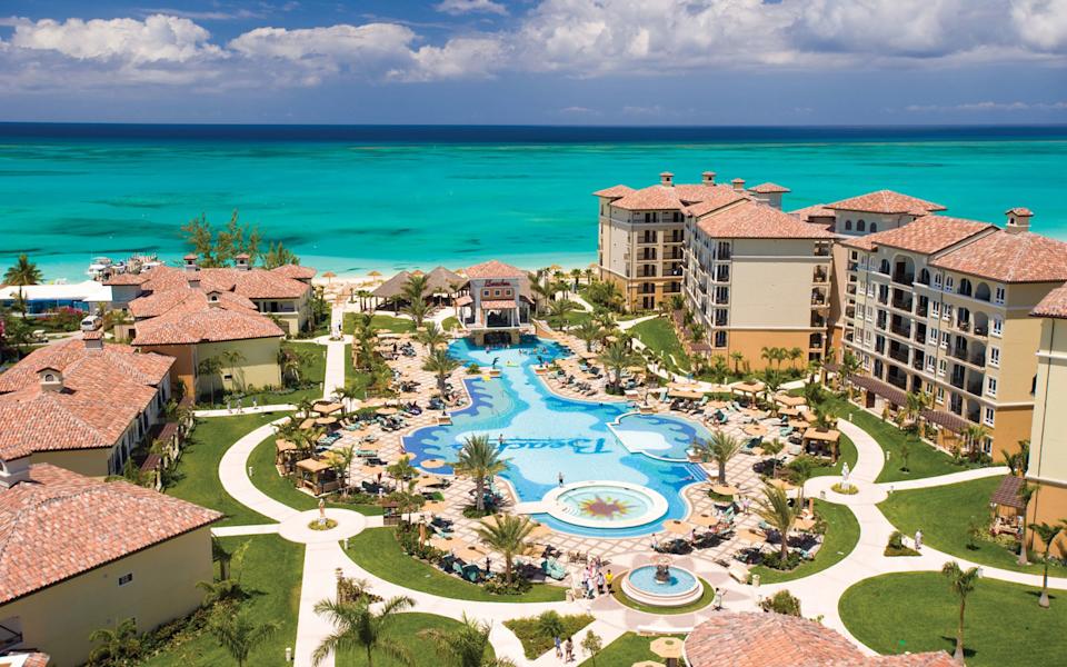 Which luxury hotels offer all-inclusive vacation packages?